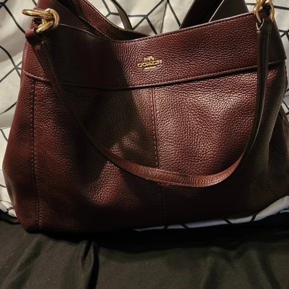 Maroon/burgundy gently used Coach handbag. More pictures can be made upon reques - Picture 2 of 4